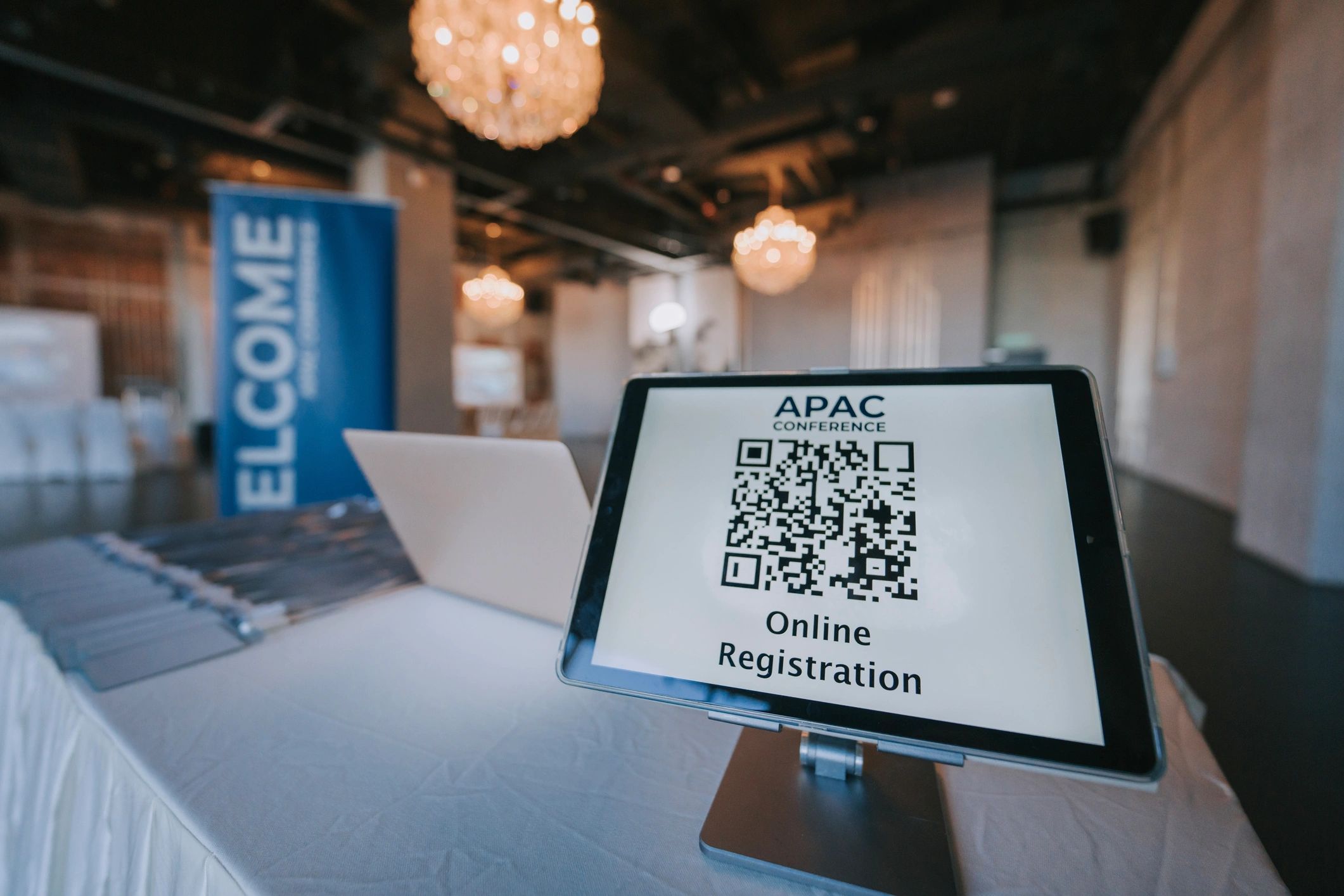 Self-serve station with a QR code on a digital display