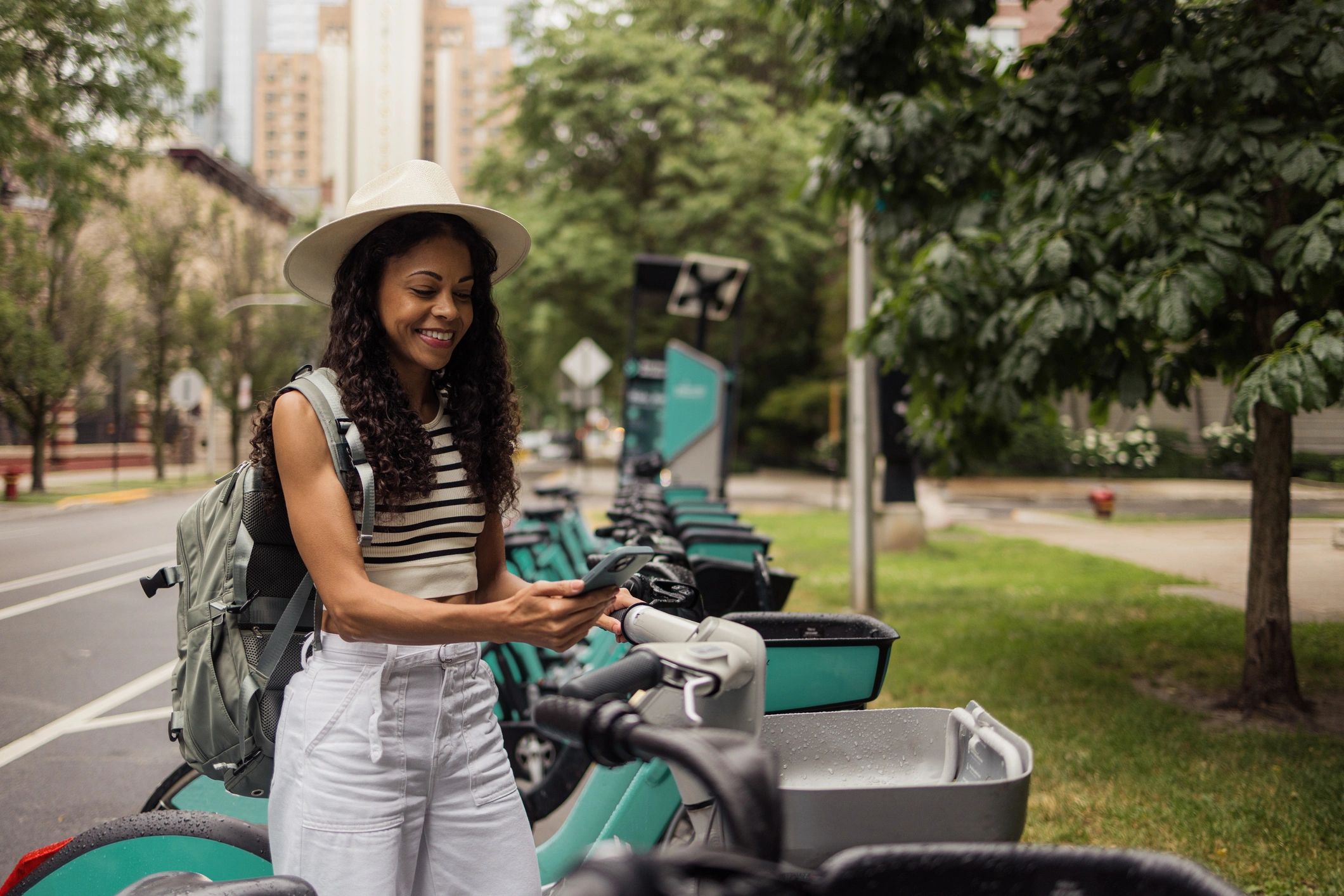 Rider scanning a QR code to unlock a rental bike